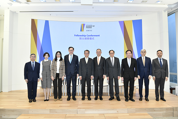 The Hong Kong Academy of Finance (AoF) confers Fellowship to three new Fellows today (14 December), including Dr Norman Chan (fourth from left), Prof Edward Chen (fourth from right) and Dr David Wong (third from right). Photo shows the three new Fellows together with the Financial Secretary of the Government of the Hong Kong Special Administrative Region and Honorary President of the AoF, Mr Paul Chan Mo-po, Chief Executive of the Hong Kong Monetary Authority and Chairman of the AoF, Mr Eddie Yue and members of the Board of Directors of the AoF.