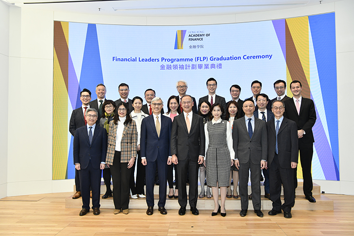 Members of the Board of Directors of the Hong Kong Academy of Finance (AoF) Mr Arthur Yuen, Ms Julia Leung, Mr Stephen Yiu, Mr Eddie Yue, Mrs Ayesha Macpherson Lau, Mr Darryl Chan and Chief Executive Officer of the AoF Mr KC Kwok (front row from the left) attend the Financial Leaders Programme (FLP) Graduation Ceremony today (14 December) with FLP Graduates (2nd and 3rd rows).