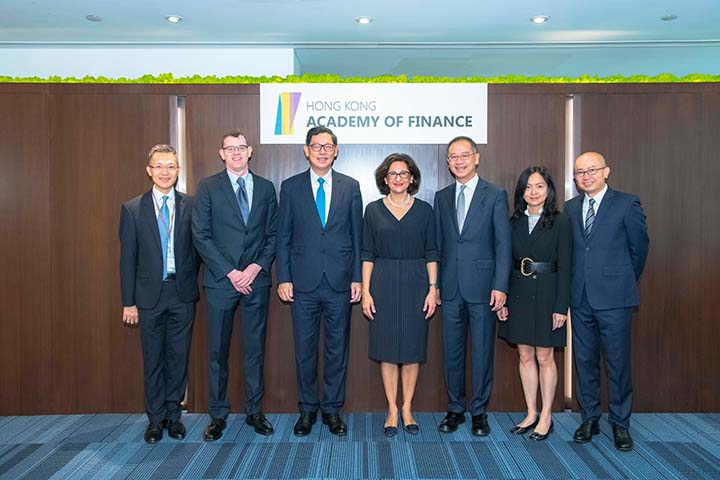 Mr Eddie Yue, Chairman of the AoF (third from right) and Mr Norman Chan, Senior Adviser of the AoF (third from left), welcome Dame Minouche Shafik (middle) to the AoF office.